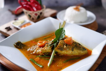 Gulai  Ikan or snapper Fish Curry is one of a typical West Sumateran, Indonesia delicious food 2