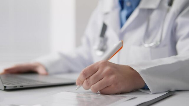 A dedicated healthcare professional is actively involved in the important process of patient documentation, ensuring accurate records and effective communication within the healthcare system