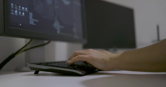 Hands Typing Code on Keyboard, Working From Home on Computer: Programming and Software Development