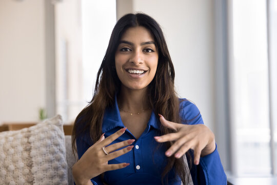 Indian woman make speech in front of camera, record videovlog for channel, share knowledge or experience, advertising or promotion product or services. Influence, social media icon, head shot portrait