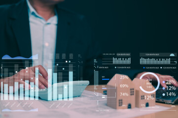 Analyzing Real Estate Market Trends, Business professional analyzing data on digital graphs and statistics for real estate investment planning, examining financial results, projections, market trends