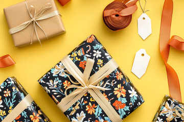 Creative gift packaging display featuring vibrant ribbons and decorative materials on a bright yellow background