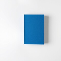 Fototapeta premium High-resolution stock photo a blue hardcover book precisely cut out against a seamless white backdrop, professional quality image ideal for commercial use, showcasing a crisp