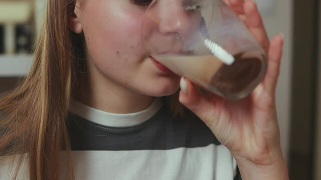 Young woman sipping chocolate milk, progressively expressing delight through six sequential stages capturing refreshing dairy experience