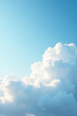 Soft and fluffy white clouds blanket the pale blue sky, wispy, serene, puffy