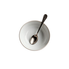 Top view of a white bowl with a metal spoon, isolated on transparent background.