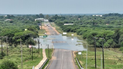 Flooding of the Notwane river bridge leading to Tlokweng from Gaborone, Botswana, Africa