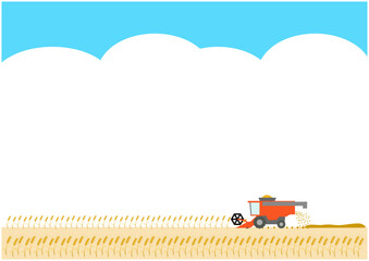 Combine harvester harvesting in a wheat field
