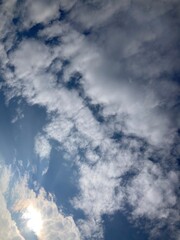 clouds and sun in the sky