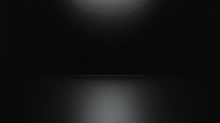 Dark reflective surface with soft light highlighting an empty space, perfect for product display or artistic installations in a minimalist setting