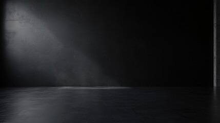 Dark and moody interior with a spotlight illuminating a textured wall and floor, creating a dramatic atmosphere for creative projects or photography sessions