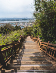 Obraz premium Jeju-do, Seongsan Ilchulbong landscape, volcanic tuff cone, Sunrise peak, Jeju Island, South Korea, Seongsan-ri, Seogwipo, Jeju Province landscape view in a sunny day, with sea, cliffs hiking trail