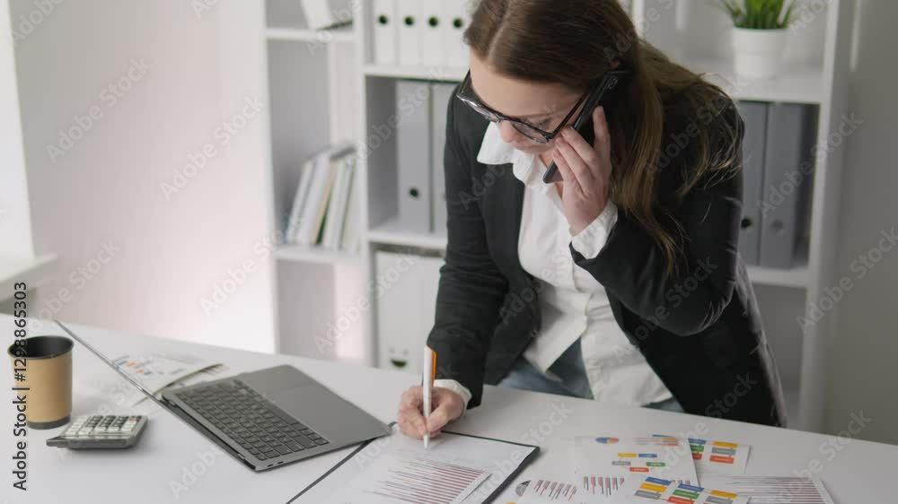 Poster a skilled business professional effectively manages tasks in a modern office, emphasizing teamwork, 