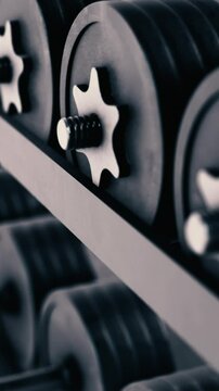 close-up of a rack with dumbbells, concept of fitness and getting stronger (3d render)