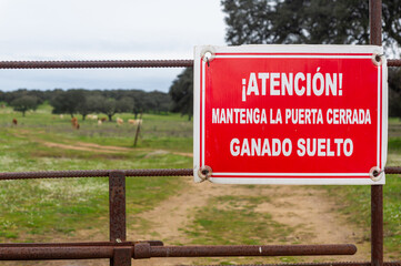 Entrance to the Cattle Ranch: Warning of Loose Livestock, Close the Gate.