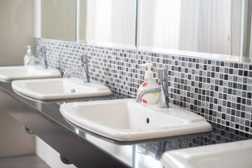 Modern Bathroom Vanity with Sink and Mosaic Tile Background