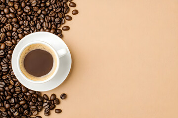 cup of cappuccino or coffee, surrounded by coffee beans on a light background with copy space,...
