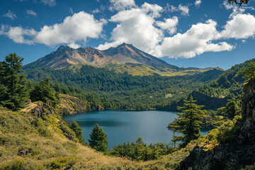 a mountain with a lake in the middle of it
