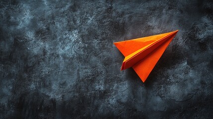paper airplane on a dark background