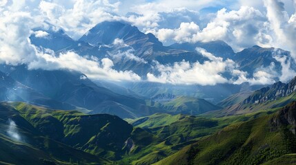 Obraz premium A panoramic view of a mountain range with clouds rolling over the peaks with