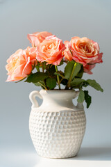 bouquet of red roses in vase