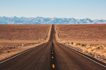 A long stretch of road in Death Valley, California.
