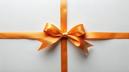 A simple, elegant amber ribbon tied in a classic bow atop a pristine white surface, perfect for gift-wrapping, crafting projects, or adding a touch of sophistication to any design.