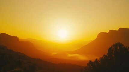 Obraz premium Misty Sunrise Over Rolling Mountains and Valley Through Trees