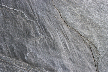 Gray stone wall close up.