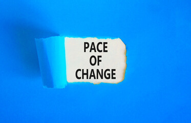 Pace of change symbol. Concept words Pace of change on beautiful white paper. Beautiful blue table blue background. Business pace of change concept. Copy space.