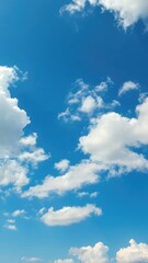 Obraz premium Azure sky with fluffy white clouds scattered across, weather, peaceful