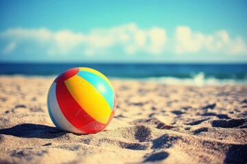 Obraz premium A beach scene featuring a colorful beach ball.