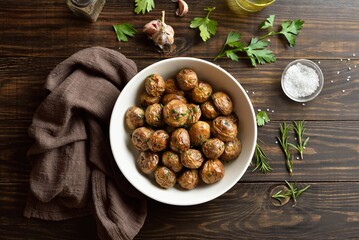 Oven baked baby potatoes with olive oil, garlic and herbs