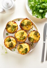 Breakfast egg muffins cups on light background