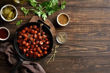 Barbecued sausage bites in cast iron skillet