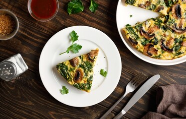 Frittata with spinach and champignon mushrooms