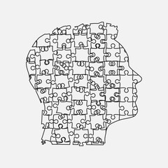 Male head from puzzle pieces, mental disorder
