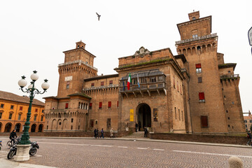 Ferrara, Ferrara,Italy March 29 2024 historic center, fortifications and castle surrounded by a moat. Squares and buildings in medieval style.Beautiful, unique Italian cities. World cultural heritage.