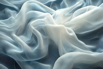Soft, flowing chiffon fabric in shades of blue and white, creating elegant drapes and folds.
