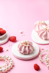 berry marshmallows on a pink background