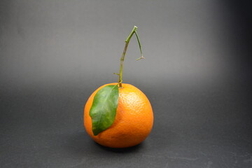 Fresh Orange Fruit with Green Leaf Stem Studio Shot c food ripe diet dark black 