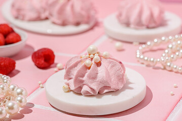 berry marshmallows on a pink background