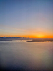 Aerial View of Coastal Landscape at Sunrise