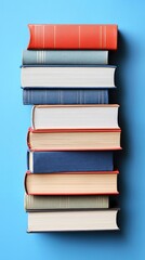 Fototapeta premium Stacked books, blue background, education, knowledge, study