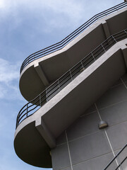 Outdoor stairs staircase of a building with steel railings.