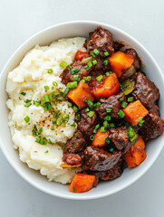 Hearty beef stew with root vegetables and creamy mashed potatoes