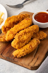Chicken tenders. Fried chicken breast strips	