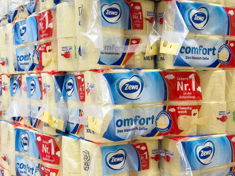 Stacked packages of zewa comfort soft toilet paper in bulk