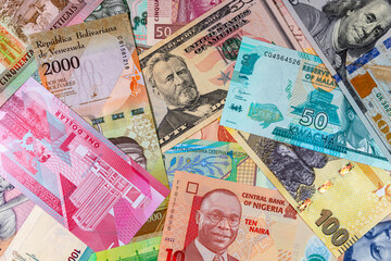 Paper and polymer money of different countries. Money background.