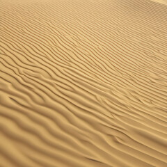 Fototapeta premium Stunning texture of sandy dunes, featuring smooth waves and natural patterns, ideal for desert-themed designs, travel projects, and natural backgrounds.